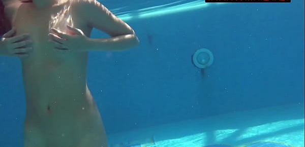  Pornstar Mia Ferrari in blue bikini underwater